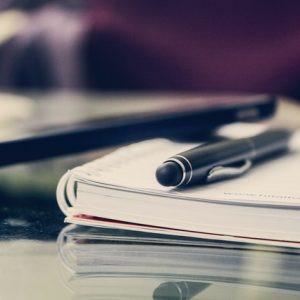 black-twist-pen-on-notebook-891059